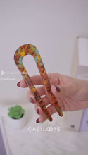 Load and play video in Gallery viewer, KIMBERLY ACETATE U SHAPED HAIRPIN

